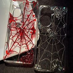 two cases with red beads on them sitting next to each other