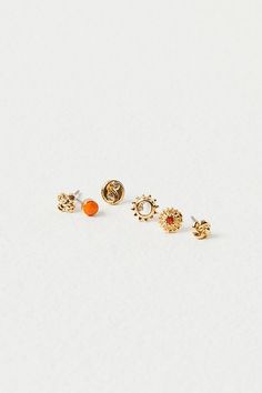 Set of 40 small delicate studs including 13 sets with shimmering stones and 7 sets with fun metal shapes. Easily mix and match to create your unique look. | Teeny Tiny Mega Stud Earring Set by Free People in Gold Natural Essence, Stud Earrings Unique, Here And Now, Birthday Wishlist, Neutral Fashion, Pretty Pastel, Stud Earrings Set, Stud Earring, Face Shapes