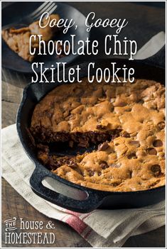 chocolate chip skillet cookie in a cast iron skillet with the words, easy gooey chocolate chip skillet cookie