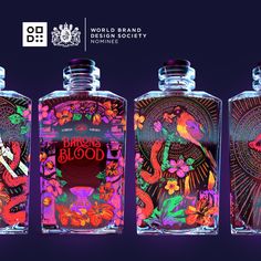 three bottles with different designs on them and the words dragon blood written in bold letters