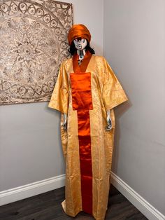 African/Nigeria bubu brocade outfit. One size. Small sized scarf. Oversized,And  Please note measurements: Width: 64inches Lenght: 62inches Long Ceremonial Abaya For Festivals, Ceremonial Long Abaya For Festivals, Traditional One-size Kimono With Kimono Sleeves, Traditional Long Orange Kimono, Traditional Long Silk Abaya, Traditional One Size Shawl Kimono, Traditional One-size Shawl Kimono, Ceremonial Long Thobe For Festivals, Traditional Long Kimono In Free Size