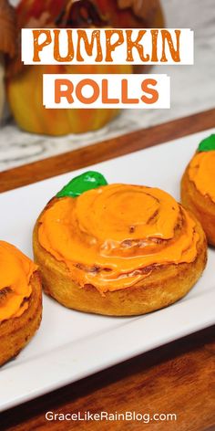 three pumpkin rolls on a white plate with the title overlay reads, pumpkin rolls