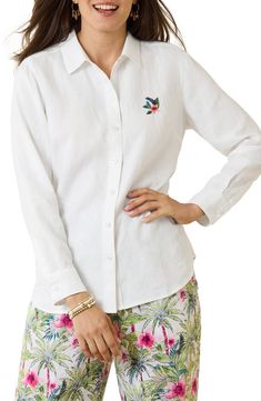 Crisp linen lets you keep your cool on a hot day in this long-sleeve button-up shirt embroidered with colorful tropical flora at the chest and back. Front button closure Spread collar Long sleeves with one-button cuffs 100% linen Machine wash, tumble dry Imported Casual Tops With Floral Embroidery And Spread Collar, Casual Floral Embroidery Tops With Spread Collar, Embroidered Linen Long Sleeve Shirt, Collared Tops With Floral Embroidery For Vacation, Casual Embroidered Shirt With Spread Collar, Floral Embroidered Collared Shirt For Vacation, Relaxed Fit Floral Embroidery Shirt For Vacation, Vacation Embroidered Collared Shirt, Embroidered Vacation Shirt With Collar