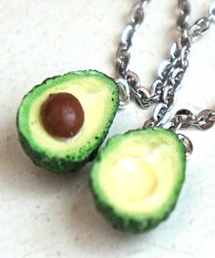 This necklace set features handmade avocado pendants made from polymer clay. The charms measure 1.5 cm and are securely attached to a silver tone chain necklace thaw measures 24 inches in length. Bronze Chain Necklace, Food Necklace, Bff Necklace, Floating Diamond Necklace, Christmas Gift Items, Vegan Jewelry, Miniature Food Jewelry, Friendship Necklace, Floating Necklace