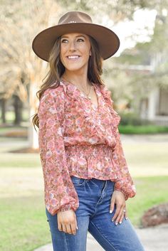 Elevate your florals with this stunning apricot toned floral top. Perfect to pair with jeans and boots to complete the look. Floral print top Apricot, Tan and Blue tones Long Sleeves Clasp closure Smocked waist Runs true to size Piper is 5'3, wears a size 2 and is wearing a Small! White Cold Shoulder Top, Summer To Fall, Floral Print Tops, Cold Shoulder Top, Cute Summer Outfits, Blue Tones, Floral Top, Cozy Sweaters, Print Top