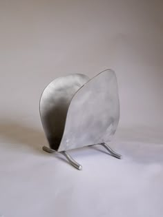 a metal object on a white background with no one in it's photo booth