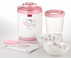 the hello kitty rice cooker is pink and white