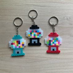 Handmade Gumball Machine Keychains Made Of Perler Beads. Set Of 3 Keychains: 1 Black Gumball Keychain 1 Red Gumball Keychain 1 Green Gumball Keychain Melted Bead Keychain, Hello Kitty Christmas Perler Beads, Cute Bead Art Ideas, Perler Beads Shoes, Bone Perler Beads, Shrimp Perler Beads, Black Panther Perler Beads, Fused Bead Art, Best Perler Bead Patterns