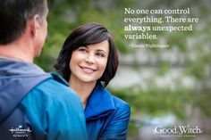 a man and woman standing next to each other with a quote on the back ground