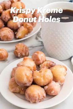 two white plates filled with donuts next to a cup of coffee