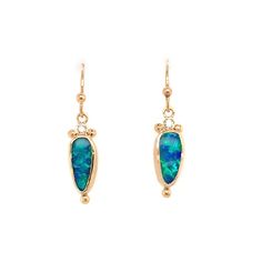 What an elegant pair of Australian Opal Doublet earrings. Made from iridescent blue and green opal set in a 14k yellow gold bezel with sterling silver back. They are accented by a 3pt brilliant white diamond and handmade solid gold ear hooks. Earrings hang approx 30mm Approx ct weight: 2.35cts This one of a kind piece is handmade to order in Emily's Hudson Valley studio. This piece is in stock and ready to shipping. If you have questions about sizing, shipping or custom orders please reach out t White Opal Earrings, Opal Drop Earrings, Handmade Jewelry Ring, Gem Diamonds, Iridescent Blue, Blue Tourmaline, Local Jewelry, Green Opal, Alternative Engagement Rings