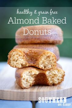 there are three doughnuts stacked on top of each other with the words healthy & grain free almond baked donuts