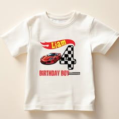 a white birthday shirt with a red race car on the front and number 4 on the back