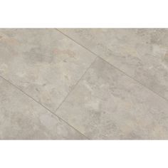 a tile floor with grey tones