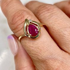 14k Yellow Gold Real Ruby gemstone Small diamond 2.6gm Size 6.5 resize available under request Thank you for visiting our shop! Please check us our Etsy Shop https://www.etsy.com/shop/DMKjewelryCo?ref=simple-shop-header-name&listing_id=1101981722 Visit our website DmKJewelry.com Also Follow us on Instagram https://www.instagram.com/dmkjewelry_/ Teardrop Ruby Ring With Diamond In Fine Jewelry Style, Teardrop Ruby Ring In Fine Jewelry Style, Fine Jewelry Teardrop Ruby Ring With Diamond, Classic Teardrop Ruby Ring, Fine Jewelry 14k Gold Pear-shaped Ruby Ring, Yellow Gold Teardrop Ruby Ring For Anniversary, 14k Gold Pear-shaped Ruby Ring, 14k Gold Pear-shaped Birthstone Ring, Diamond Teardrop Birthstone Ring