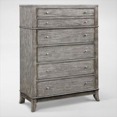 an old chest of drawers with five drawers