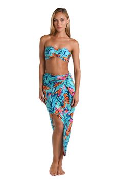 This pareo cover up features a vibrant and tropical floral print with a mix of teal, blue, pink, and orange hues, creating a lively and eye-catching pattern. The bold use of color and the large-scale floral motifs give the piece a fresh and summery feel. The sarong-style look with a faux wrap at the side offers a chic silhouette, looking equally beautiful resting around your hips over a swimsuit as it does paired with a cami. [split] Details Pareo cover-up Faux wrap Versatile style Fabric 95% Vi Multicolor Tropical Print Sarong For Poolside, Multicolor Tropical Print Beachy Sarong, Beachy Multicolor Sarong With Tropical Print, Hawaiian Multicolor Sarong With Tropical Print, Blue Swimwear With Vibrant Print, Blue Bold Print Swimwear For Vacation, Blue Swimwear With Bold Print For Beach, Blue Swimwear With Bold Print For Vacation, Tropical Print Sarong For Beach Party