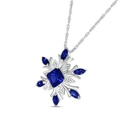 Celebrate her favorite season with the wintry design of this princess and marquise-cut blue lab-created sapphire and diamond accent snowflake pendant. Crafted in sterling silver This look features a tilted 5.0mm princess-cut bright blue lab-created sapphire glistening at the center of a sculpted snowflake frame. Diamond accents adorn the frame while marquise-cut blue lab-created sapphires glisten at the ends to complete this beautiful style. The pendant suspends along an 18.0-inch rope chain that secures with a spring-ring clasp. Diamond White Cubic Zirconia Snowflake Jewelry, Diamond White Snowflake Jewelry For Formal Occasions, Formal Snowflake Diamond White Jewelry, Elegant Jewelry For Anniversary In Winter, Fine Jewelry Snowflake Cubic Zirconia, Snowflake Shaped Cubic Zirconia Fine Jewelry, Blue Snowflake Sterling Silver Necklace, Blue Diamond Marquise Jewelry, Blue Marquise Diamond Jewelry