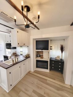 the kitchen is clean and ready for us to use in its new owner's home