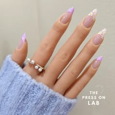 ✨ Don't Miss Out! ✨ Buy 3 nail sets, get 1 FREE random set! 💅 No code required. 🎁 Enjoy FREE shipping on US orders over $35. 🚚 💕24 pcs Pink Lavender Floral Almond Press On Nail💕 💕24 pcs (12 different size x 2 )  💕Medium Almond Shape 💕What's included? - FULL set (24 nails) - application instructions - mini buffer  - cuticle pusher - nail glue - 2x Alcohol Wipe 💕Disclaimer Display monitors may slightly distort the lighting and color of the photos. Light Purple Nails, Lilac Nails, Graduation Nails, Purple Nail Designs, Lavender Nails, Floral Nail Designs, Daisy Nails, Purple Daisy, Nail Sets