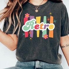 This t-shirt is everything you've been dreaming of! Soft, lightweight, and with just the right amount of stretch, it's designed to be comfortable and flattering for everyone. Ideal for women's clothing, this retro graphic tee is perfect as a unique gift for her, whether for your daughter, mom, or as a big sister gift. 100% combed and ring-spun cotton (Heather colors contain polyester) Fabric weight: 4.2 oz./yd.² (142 g/m²) Pre-shrunk fabric Side-seamed construction Shoulder-to-shoulder taping Et Vintage Multicolor T-shirt With Letter Print, Retro Multicolor T-shirt With Custom Print, Retro Multicolor Custom Print T-shirt, Retro Cropped T-shirt With Letter Print, Multicolor Retro T-shirt With Letter Print, Multicolor Vintage T-shirt With Letter Print, Multicolor Retro Tops With Letter Print, Vintage Multicolor Letter Print T-shirt, Multicolor Retro Print T-shirt