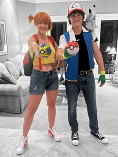 a man and woman dressed up in pokemon cosplay costumes standing next to each other