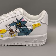 "Customize your kicks with the Nike Air Force 1 Cartoon Character Custom. Express your personality with a one-of-a-kind design featuring your favorite cartoon character. Expertly crafted for comfort and durability. Upgrade your sneaker game today." ★ Brand new with box ★ Each pair is unique and one of a kind ★ Each pair is personally handmade, painted with high quality Angelus. ★ Leather acrylic paint. Topped with a clear coat for extra protection. ★ Available in all sizes including men and wome 12th Man, Favorite Cartoon Character, Sneaker Games, Air Force 1, Our Kids, Nike Air Force, Cartoon Characters, Air Force, Nike Air