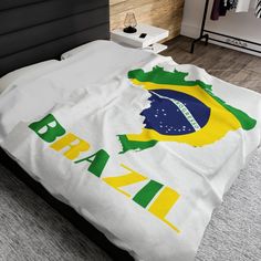 a bed with a brazil flag on it