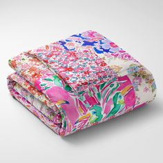 three sheets with colorful floral designs on them