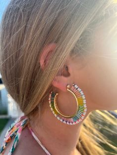 Rainbow and white bugle and heishi beads handmade together to create the ultimate summer fringe hoop earrings. 2.30 " in diameter 10k gold plated Summer Fringe, Fringe Hoop Earrings, Bugle Beads, Beads Handmade, Heishi Beads, Earrings White, Beaded Hoops, Beaded Fringe, Bracelet Stack