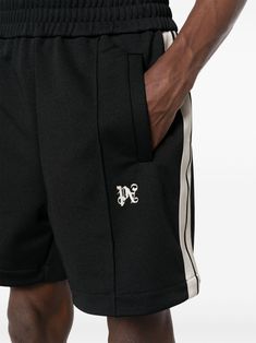 Bermuda shorts with PALM ANGELS logo in black, characterized by elasticated waist, front logo, two side pockets. This item is in size M and the color is Streetwear Shorts With Logo Waistband, Sporty Shorts With Logo Waistband For Streetwear, Casual Streetwear Shorts With Logo Waistband, Black Casual Shorts With Logo Waistband, Casual Shorts With Logo Waistband For Streetwear, Black Bottoms With Logo Waistband In Short Length, Casual Black Bottoms With Logo Waistband, Black Bottoms With Logo Waistband, Short Length, Casual Black Bottoms With Logo Detail