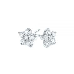 These stunning stud earrings feature round brilliant cut diamonds clustered in a floral shape and prong set in white gold.  Designed and created by Joseph Jewelry | Seattle, WA | Bellevue, WA | Online | Design Your Own Jewelry White Gold Flower Earrings With Brilliant Cut, Gia Certified Cluster Earrings For Formal Occasions, Fine Jewelry Bridal Cluster Earrings With Brilliant Cut, Formal Flower Shaped Diamond Earrings With Prong Setting, Fine Jewelry Cluster Bridal Earrings With Brilliant Cut, Fine Jewelry Cluster Earrings With Brilliant Cut, Diamond White Cluster Earrings With Brilliant Cut, White Gold Cluster Earrings With Prong Setting, Anniversary Cluster Earrings With Prong Setting