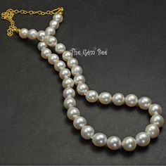 "DESCRIPTION: Thank you for coming in! A spectacular necklace with white South Sea baroque pearl and 18k yellow gold findings! The pearls have fun baroque shapes and extremely fine satin like luster and pure white color! A family heirloom for any lady! Adjustable length 18.5\"-24.5\" which will suit more occasions and outfitters! 377.5 carats! You'll get the necklace you see in the picture! SIZE: 10mx10.5mm-12.5mmx13.1mm GRADE: Smooth Satin-Like Surface COLOR: Pure White" Baroque Pearl Necklace, Sky Blue Topaz, South Seas, Family Heirloom, Picture Size, Wow Products, Baroque Pearls, Pure White, Spring Rings