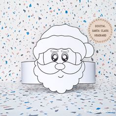 a paper cut out of santa claus with confetti sprinkles around it