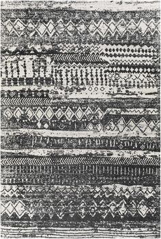 a black and white rug with different patterns