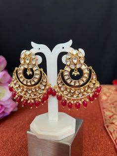 Pachi Kundan Earrings/Maroon Beads Drop Earrings /2.6 inches Long Gold Finish/Gift Earrings /Indian Jewelry This Earrings or perfect for smart casual daily wear but can also be worn with a fancy outfit for a party and Gift ! DETAILS: Includes Two Earrings only. Length: 2.6 inches Weight for Earring Set: 0.80oz (24g) Earring backs push on/off.  Material: Antique Gold. Red and green Kemp CZ Stones. Finish: Premium Gold Finish.  NOTE: We try our best to show you photos of our items as they appear i Temple Jewelry Beaded Earrings For Parties, Temple Jewelry Chandbali Beaded Earrings, Temple Jewelry Earrings With Dangling Beads For Gift, Festive Traditional Beaded Earrings, Festive Beaded Earrings For Gift, Celebration Chandbali Beaded Earrings, Beaded Chandbali Earrings For Celebration, Celebration Beaded Chandbali Earrings, Traditional Celebration Beaded Earrings With Round Beads