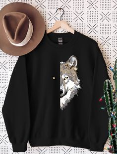 "Wolf Sweatshirt, Wolf Figure Sweatshirt Hoodies, Galaxy, Grey Wolf, Hunting Ground, Gift for Wolves Lover,A Wolf Story,Birthday Present Gift WELCOME TO \"StyleDesignUS\" High quality and super soft, comfortable Sweatshirt and Hoodies. Made with top of the line vinyl and pressed with a professional grade heat press. SIZING AND COLORS Make sure you check our size-chart before you place your order. If you are not sure about sizing please measure your favorite Sweatshirt or Hoodie and compare measu Fall Season Hoodie Sweatshirt As A Gift, Fall Hoodie Sweatshirt As Gift, Black Hooded Sweatshirt Gift, Black Hooded Sweatshirt As Gift, Fall Sweatshirt Hoodie As A Gift, Black Crew Neck Top With Wolf Design, Black Long Sleeve Top As Gift, Black Long Sleeve Top As A Gift, Graphic Print Long Sleeve Hoodie As A Gift