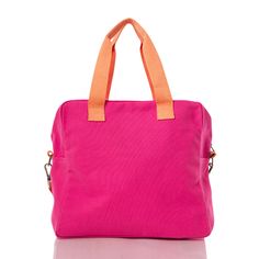 a pink handbag with an orange handle