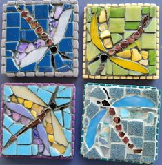 three dragonflys made out of mosaic tiles