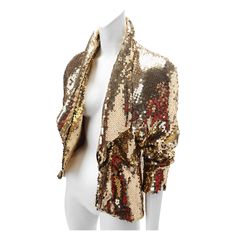 1980s Thierry Mugler Gold Sequin Jacket; Fitted jacket with lapels, gathered at waist with three gold metal snap closures; Dolman sleeves with notch at cuffs; Fully lined. Labeled Thierry Mugler Paris. Size 40. Fits US size 4. Some sequin loss which does not distract from the garment. Gold Sequin Jacket, Daisy Jones, Fitted Jacket, Sequin Jacket, Thierry Mugler, Gold Sequin, Workout Jacket, Dolman Sleeve, Metallica