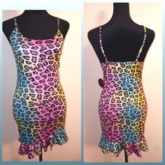 Sexy Colorful Leopard Print Dress By: Hot Miami Styles Size: Medium Multicolor Print Sleeveless Mini Dress For Party, Sleeveless Multicolor Print Mini Dress For Party, Flirty Pink Bodycon Dress For Club, Pink Mini Bodycon Dress For Club, Trendy Pink Mini Dress For Club, Multicolor Stretch Dress For Club, Multicolor Stretch Mini Bodycon Dress, Multicolor Stretch Bodycon Mini Dress, Trendy Multicolor Stretch Mini Dress