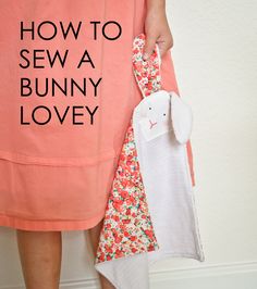 a woman holding an umbrella with the words how to sew a bunny lovey on it