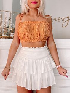 Macy Orange Ruffle Crop Top | Sassy Shortcake Flirty Spring Camisole Crop Top, Spring Flirty Cami Crop Top, Flirty Cami Crop Top For Spring, Flirty Cropped Tube Top For Summer, Spring Crop Top With Spaghetti Straps And Ruffles, Spring Orange Cropped Crop Top, Fitted Ruffle Cami Crop Top, Summer Cotton Crop Top With Ruffled Straps, Ruffled Cropped Top For Day Out