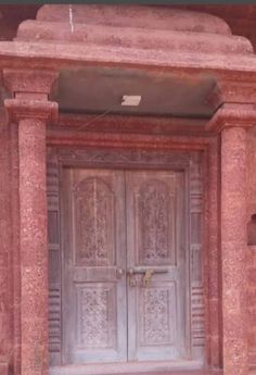 an old door with ornate carvings on it