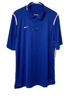 Nike Dri-fit Men's polo shirt. Blue with white on sides. Elevate your everyday look with The Nike Polo, an icon built for sport but also worn as an expression of style. Dri-Fit technology combined with classic street style design make this the perfect versatile piece to be worn for any occasion. New with Tags. Great Condition Warehouse overstock Shipped with USPS Priority Mail TBO10 Team-colored Cotton Polo Shirt For Golf, Team-colored Short Sleeve Polo Shirt For Sports, Sporty Team-colored Short Sleeve Polo Shirt, Blue Short Sleeve Golf T-shirt, Blue Moisture-wicking Collared Polo Shirt, Blue Collared Polo Shirt With Moisture-wicking, Nike Cotton Short Sleeve Polo Shirt, Blue Moisture-wicking Polo Shirt With Collar, Casual Blue Moisture-wicking Polo Shirt