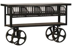 a cart with two baskets on it and three wheels around the bottom one is black