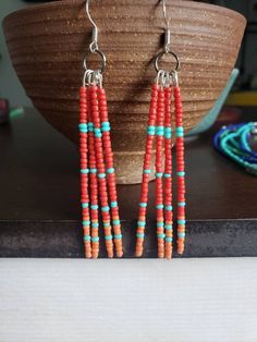 These beautiful earrings are made from glass seed beads and are 3 inches long. The perfect accessories for a dressed up or casual look! Western Seed Bead Earrings, Red Beaded Fringe Earrings For Beach, Beaded Heishi Dangle Earrings For Beach, How To Make Seed Bead Earrings, Western Beaded Earrings, Funky Earrings Diy, Simple Beaded Earrings, Boho Earrings Diy, Craft Earrings