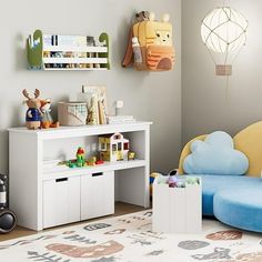 a child's playroom with toys and decor