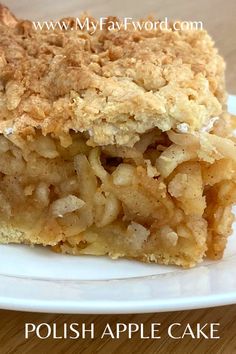 a close up of a piece of food on a plate with the words polish apple cake