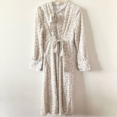 New Ditsy Floral Boho Feminine Flowy Cottagecore Prairie Bow Tie Midi Dress Size Tag Says L But Fits Slightly Small, Would Be Best On M 17in Pit To Pit 46in Length (Midi/ Maxi Cut) Excellent Condition With No Flaws, Nwt Adorable Neck & Waist Tie Details Long Sleeve With Preppy Details Korean Brand 15% Off Bundles Of 3+ Items From My Shop! Cream Midi Dress For Spring Daywear, White Feminine Floral Dress For Fall, Feminine Cream Floral Dress For Brunch, Cream Floral Dress For Brunch, White Floral Dress For Fall Brunch, Vintage White Floral Dress For Spring, White Vintage Floral Dress For Spring, Beige Long Sleeve Floral Dress For Spring, Beige Cottagecore Midi Dress For Spring